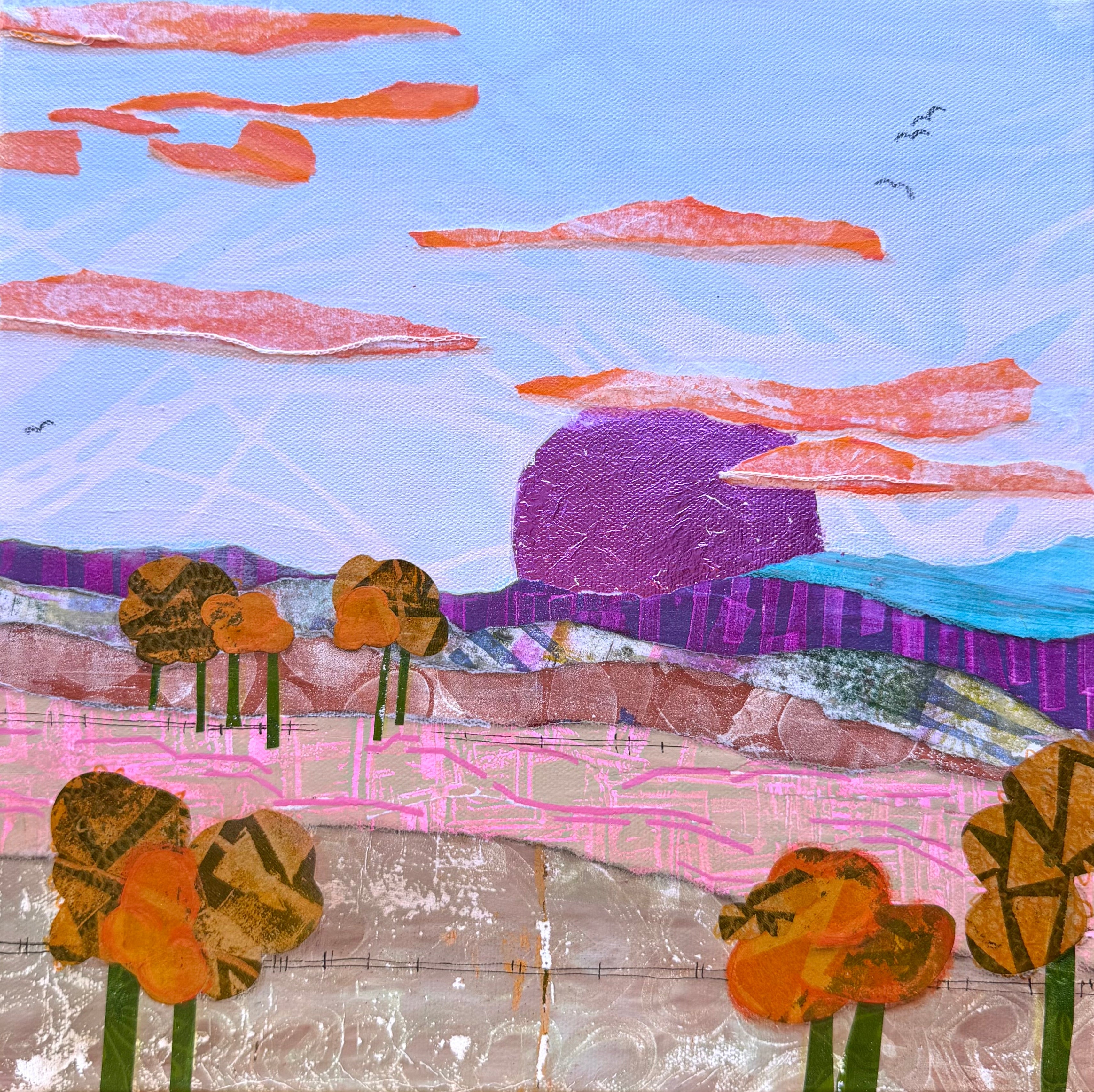 A textured mixed-media landscape painting on canvas featuring a light blue sky with orange clouds, a prominent purple sun, and stylized orange and brown trees with green stems in a rolling hills scene.